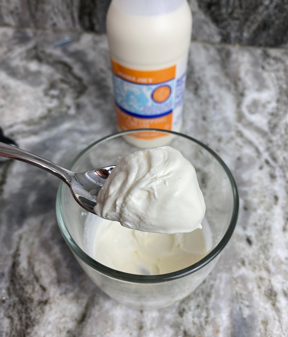 https://cheatdaydesign.com/wp-content/uploads/2022/06/Heavy-whipping-cream-on-spoon.jpg