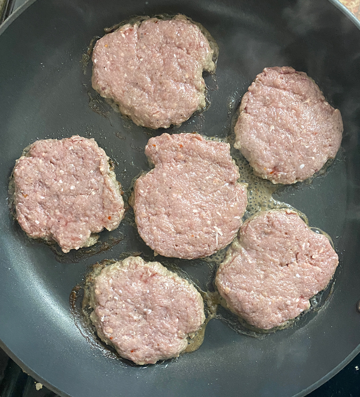 Sausage patties in pan