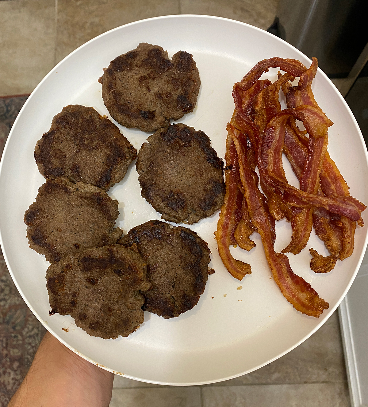 Turkey sausage and bacon on plate